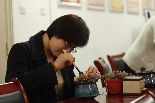 87978797威尼斯老品牌举办妇女节园艺活动